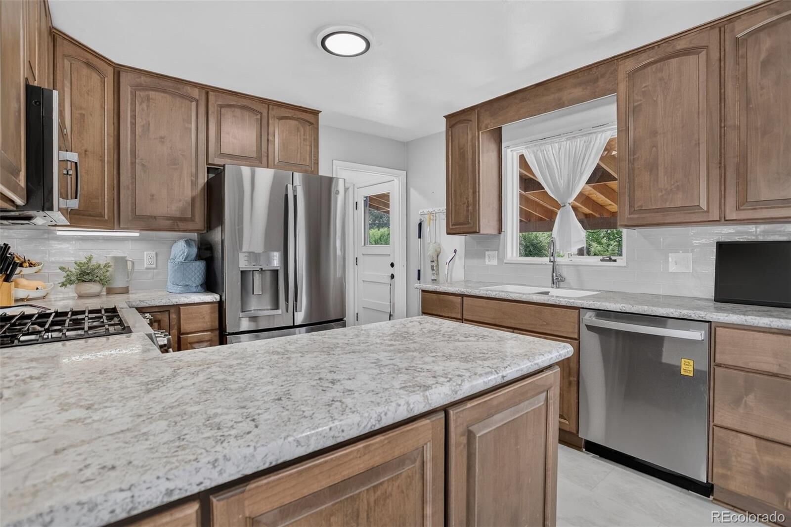 Property Photo:  2940 W Saratoga Avenue  CO 80110 