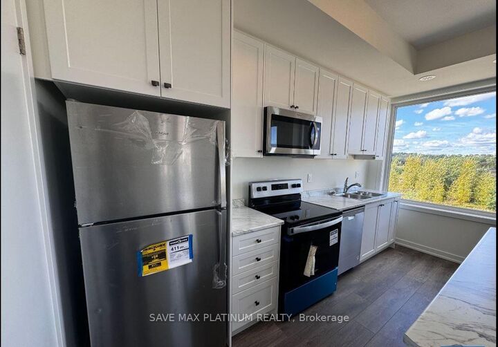 Property Photo: 160 Densmore Road 1403 ON K9A 0X8