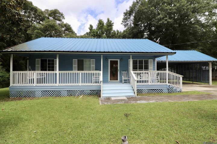 Property Photo:  10390 Carolina St  LA 70789 