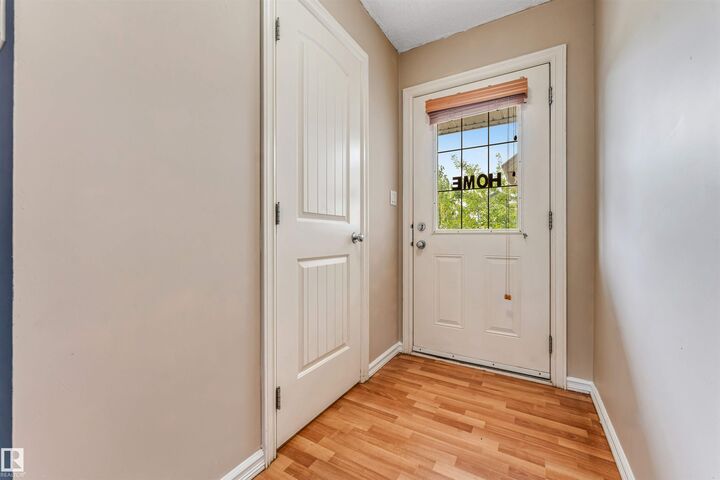 Property Photo:  7743 8 Avenue SW  AB T6X 0A3 