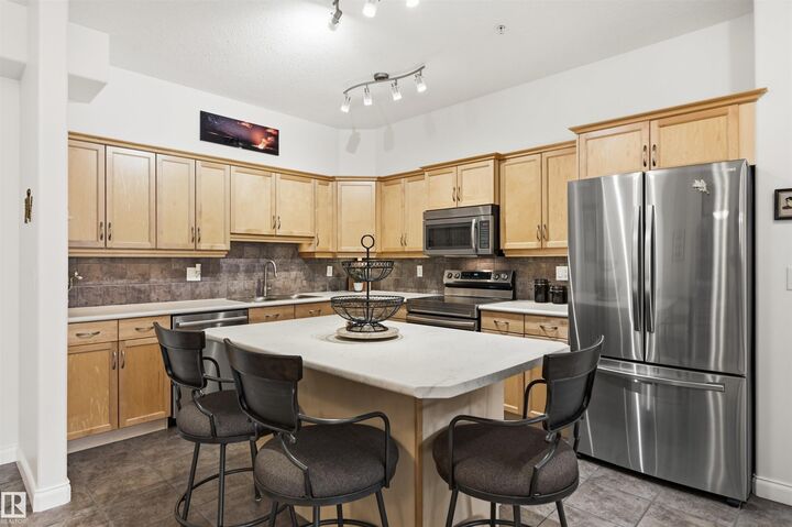 Property Photo: 1406 Hodgson Way NW 338 AB T6R 3K1