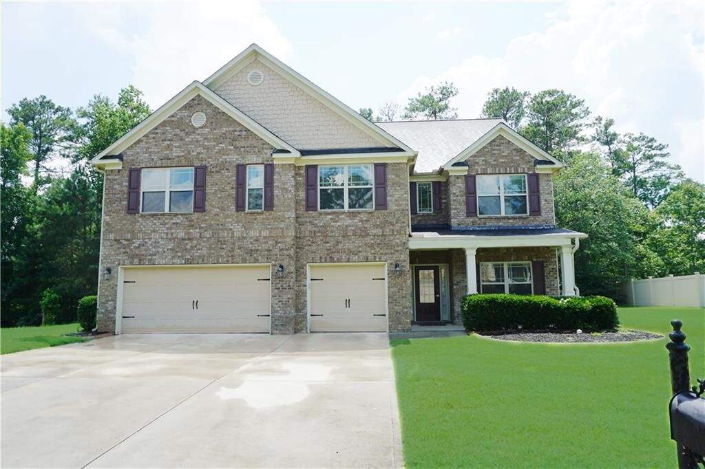 Property Photo: 5669 Woodland Greens Road GA 30135