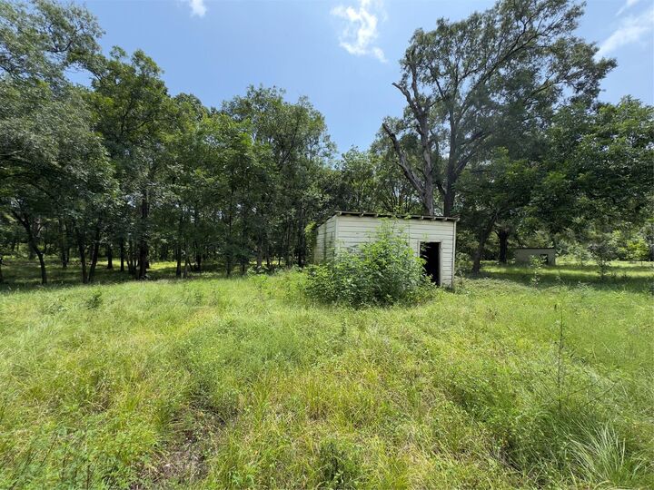 Property Photo: 947 County Road 2850 TX 77327