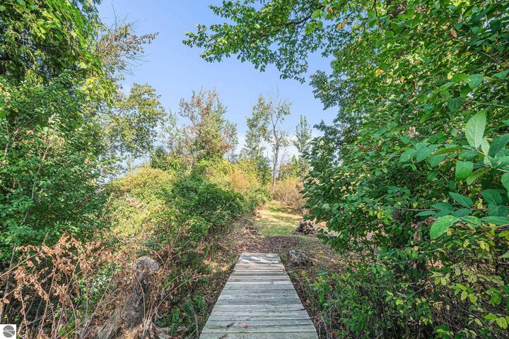 Property Photo:  12016 Peninsula Drive  MI 49686 
