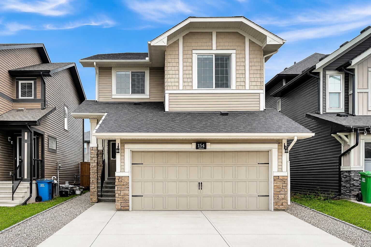 Property Photo:  154 Buckskin Way  AB T4C 2R7 
