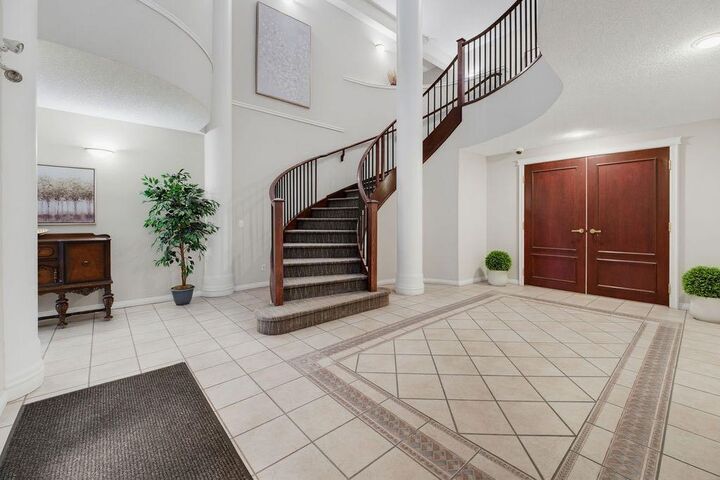 Property Photo: 4835 Dalhousie Drive NW 205 AB T3A 5R7