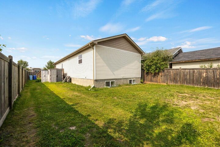 Property Photo:  209 Ash Way  AB T9K 0E9 