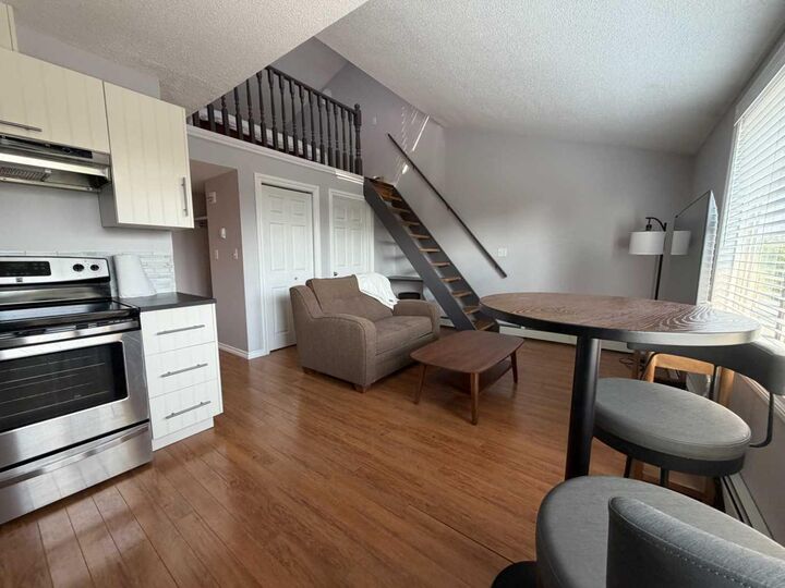 Property Photo:  7201 Poplar 4205  AB T8V 6C5 