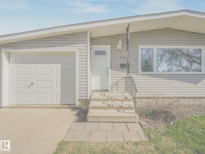 Property Photo: 5916 148 Avenue NW AB T5A 1T9