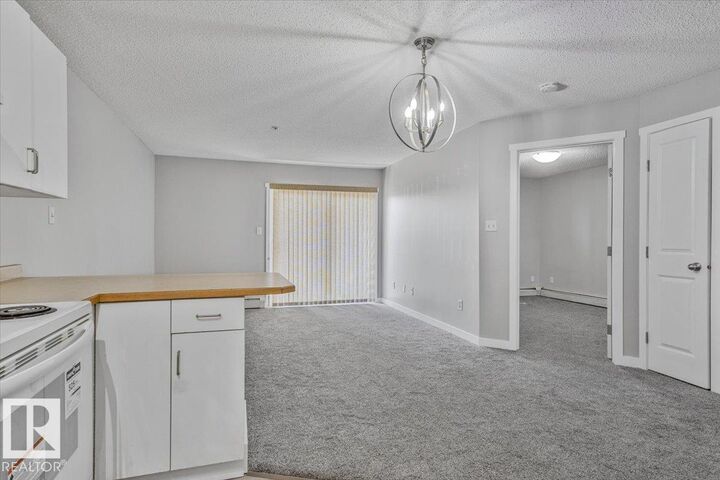 Property Photo:  11325 83 Street NW 130  AB T5B 4W5 
