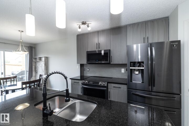 Property Photo:  1640 Chapman Way SW  AB T6W 0Y5 