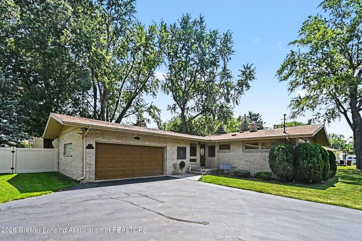 Property Photo:  4466 Arbor Drive  MI 48864 