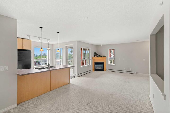 Property Photo:  5115 Richard Road SW 416  AB T3E 7M7 