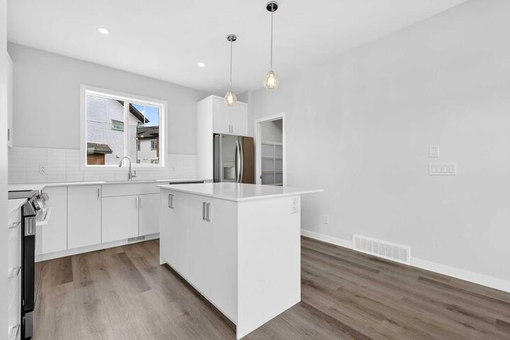 Property Photo: 132 Red Embers Link NE 1027 AB T3N 2X8