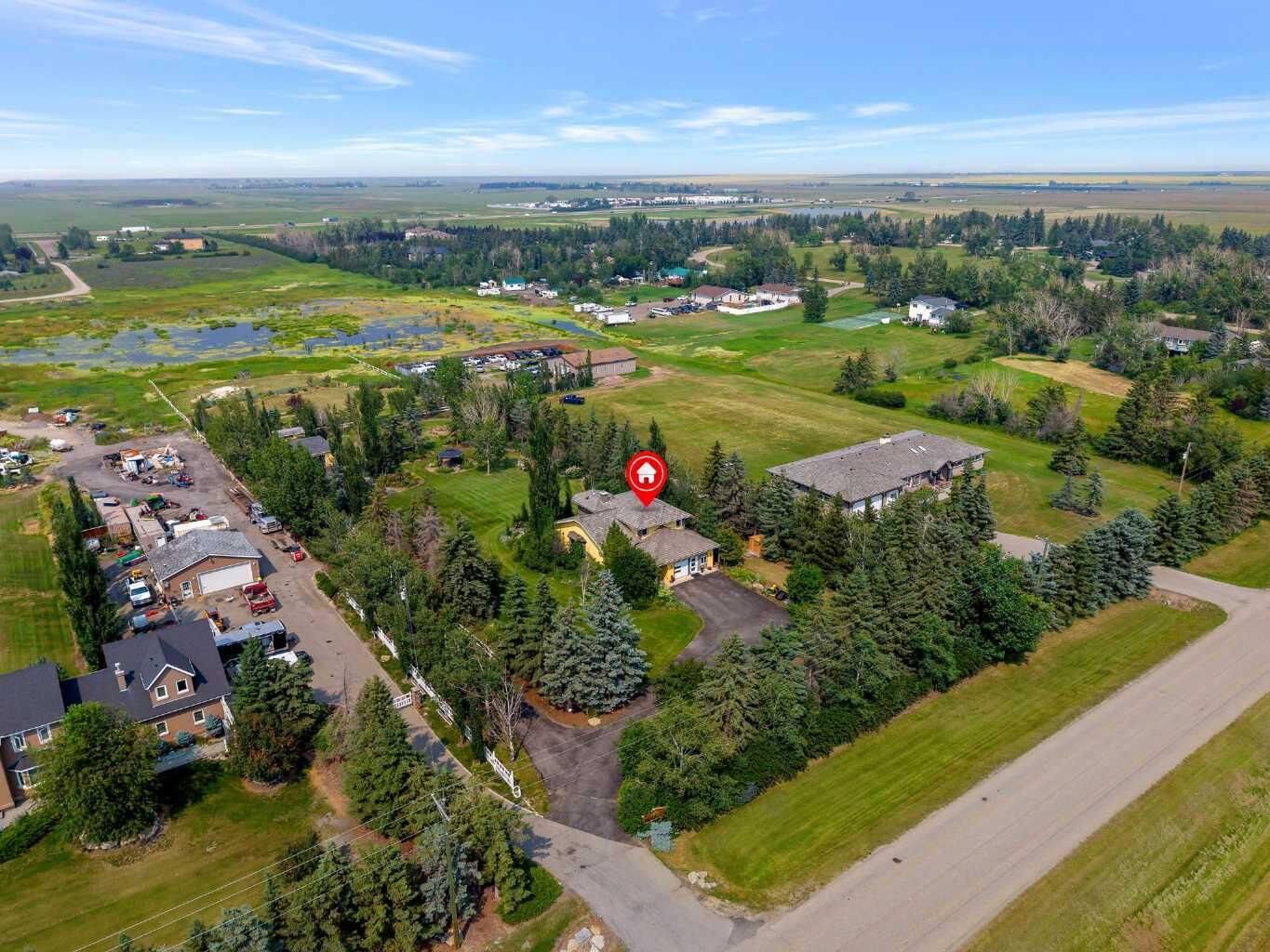 Property Photo: 280140 Township Road 241A AB T1X 0M5