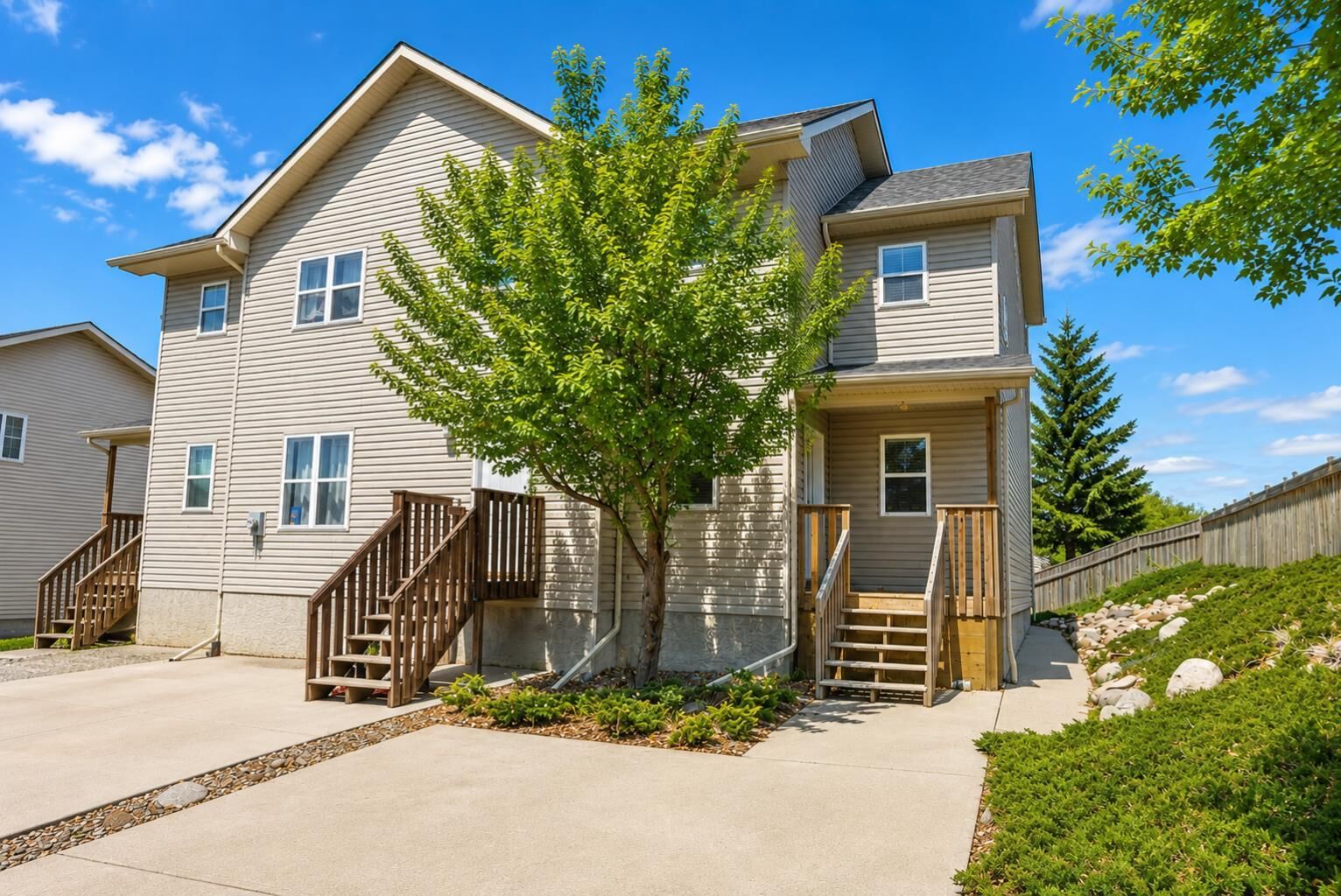 Property Photo: 720 Heritage Boulevard W 16 AB T1K 7X2