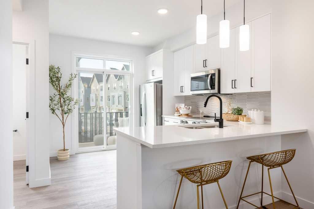 Property Photo: 437 Alpine Avenue SW 702 AB T2Y 0Z8