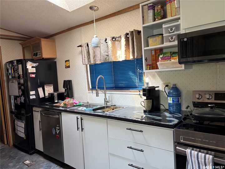Property Photo:  59 Mulberry Road  SK S7B 0A4 