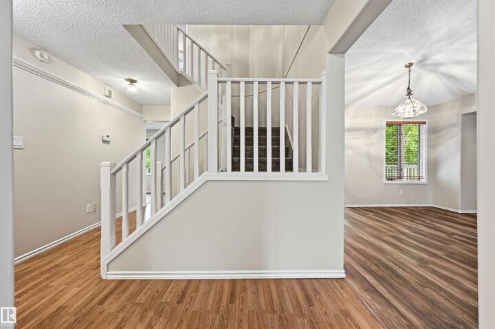 Property Photo: 219 Buchanan Close NW AB T6R 2B7