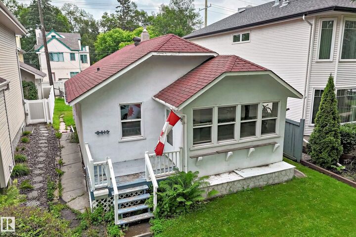 Property Photo: 9413 101 Street NW AB T5K 0W5