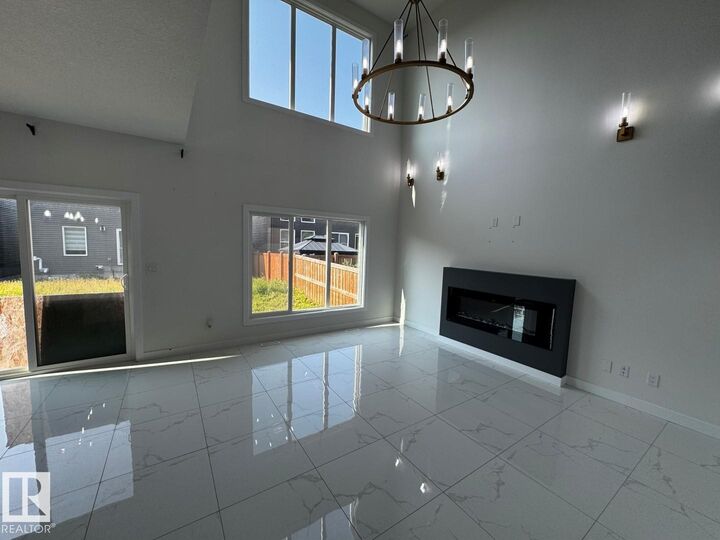 Property Photo:  5741 Kootook Way SW  AB T6W 4V9 