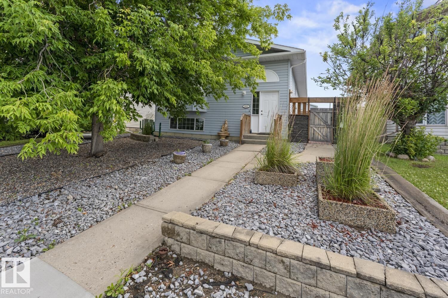 Property Photo: 4813 45 Street AB T9M 1Z6