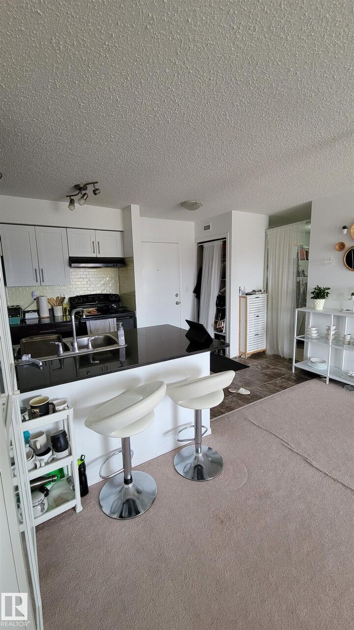 Property Photo: 12045 22 Avenue SW 415 AB T6W 2Y2