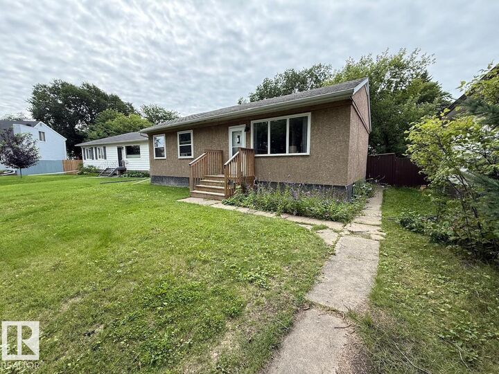 Property Photo:  7607 83 Avenue NW  AB T6C 1A2 
