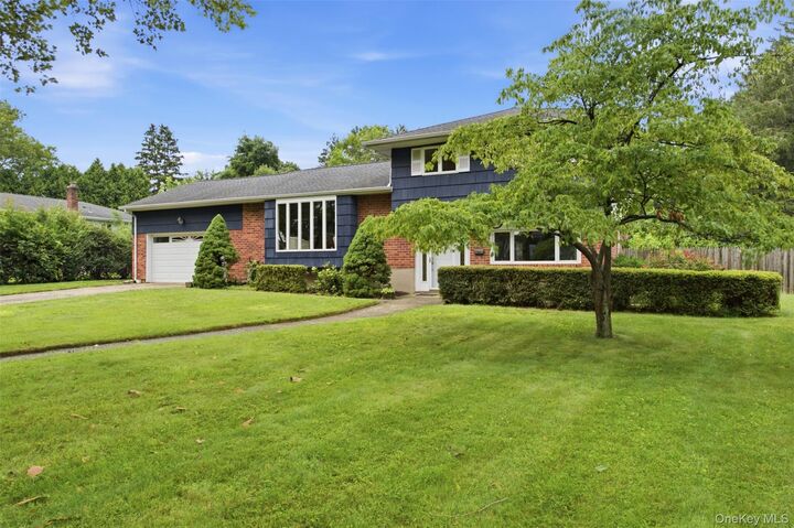Property Photo: 36 Cherrywood Drive NY 11731