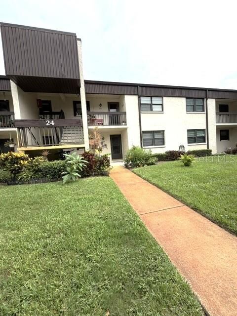 Property Photo:  2400 Winding Creek Boulevard 24-102  FL 33761 
