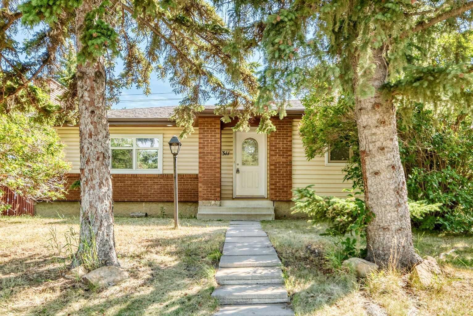 Property Photo: 311 72 Avenue NE AB T2K 0P1