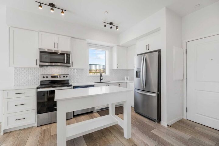 Property Photo:  3727 Sage Hill Drive NW 3104  AB T3R 1T7 