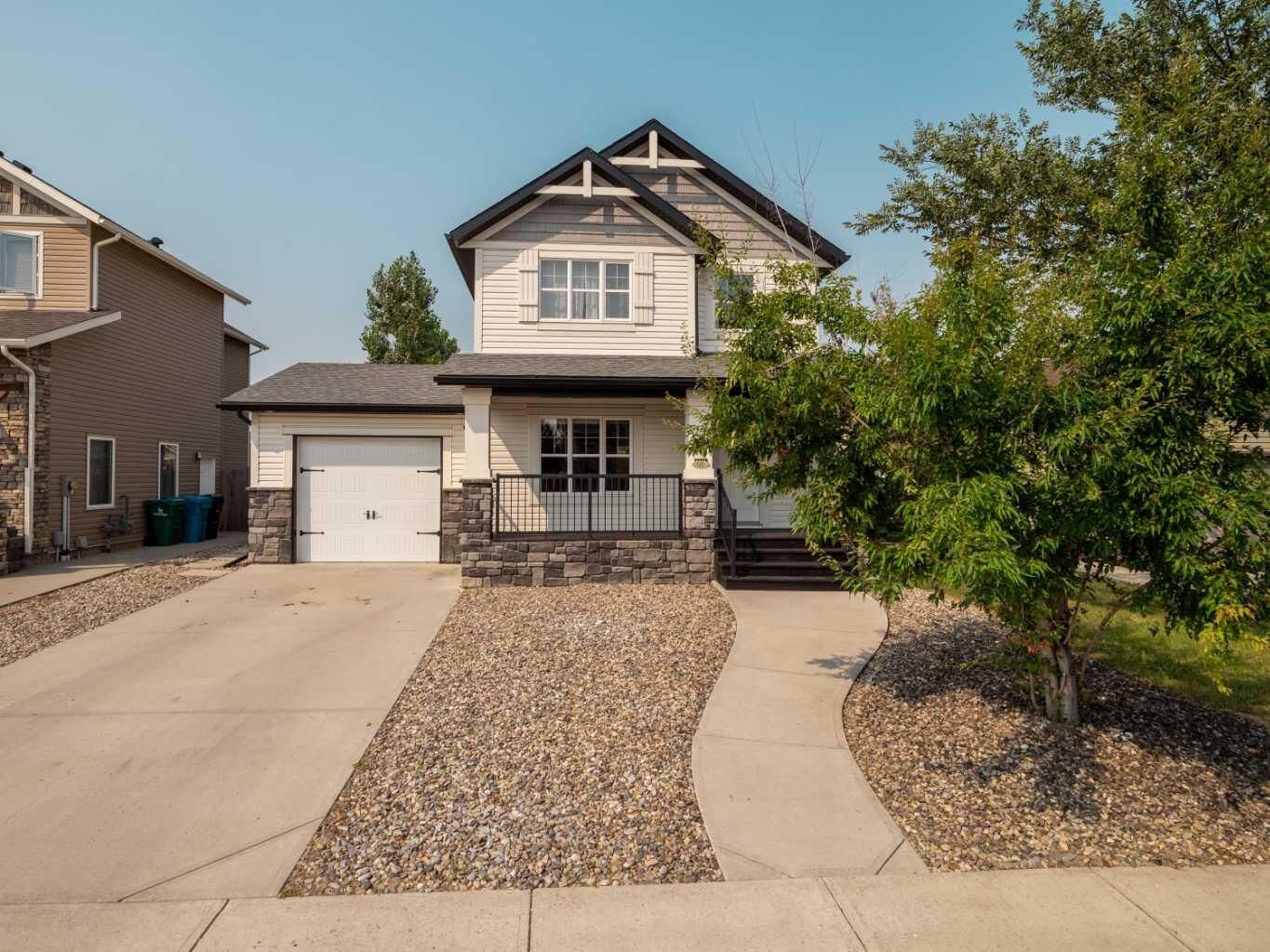 Property Photo:  120 Mt Sundial Court W  AB T1J 5B7 