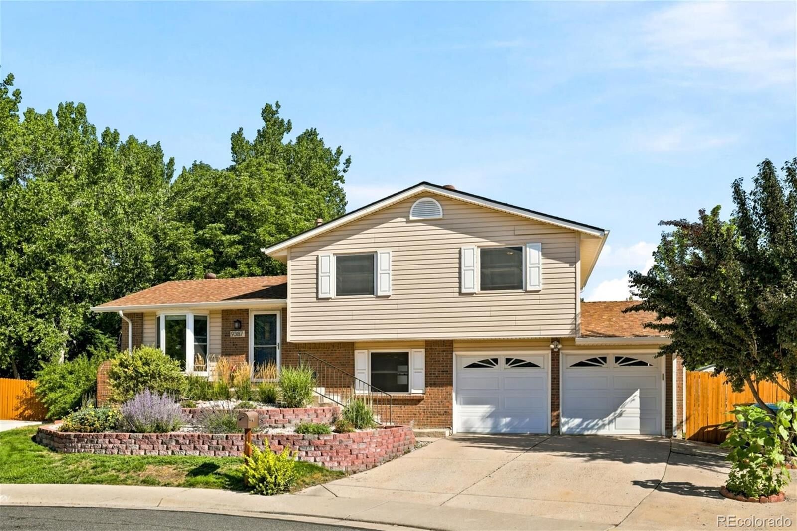 Property Photo: 9387 W Iowa Circle CO 80232