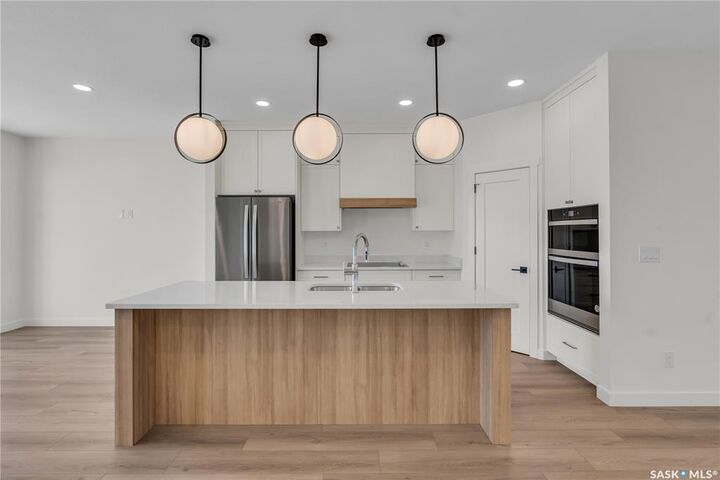 Property Photo:  720 Brighton Boulevard 6  SK S7V 1X1 