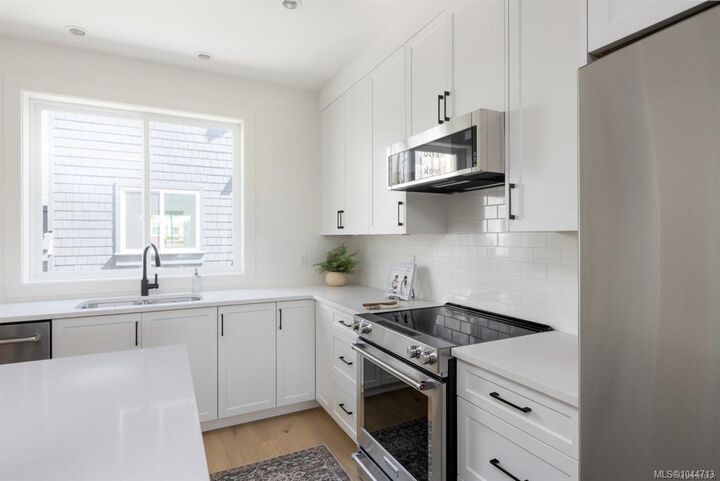 Property Photo:  10145 Fifth St #7  BC V8L 0E4 