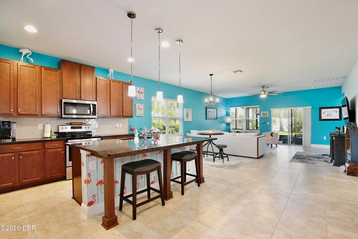 Photo de la propriété:  5529 Estero Loop  FL 32128 