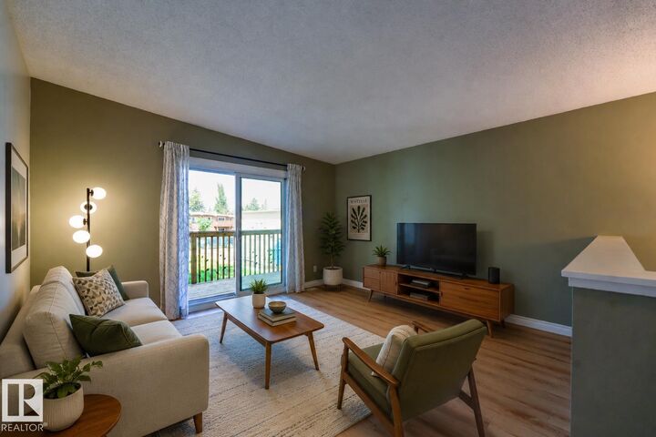 Property Photo:  8920A 144 Avenue NW  AB T5E 5V4 