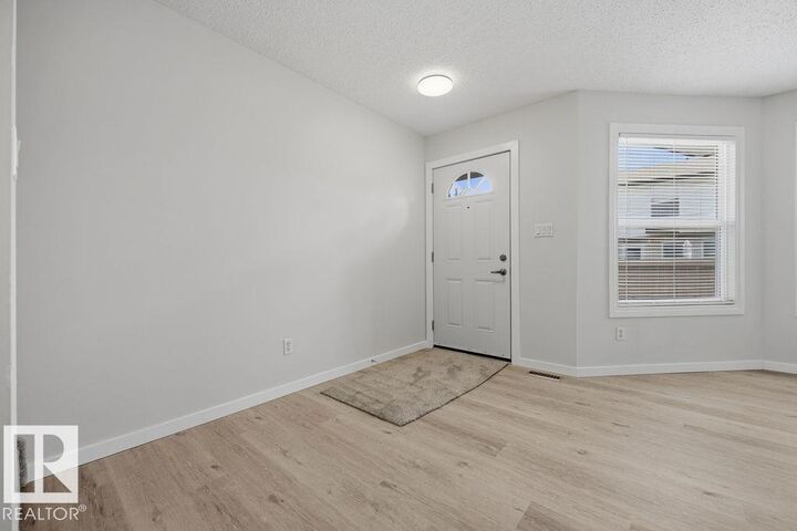 Property Photo:  10473 24 Avenue NW  AB T6J 4S2 