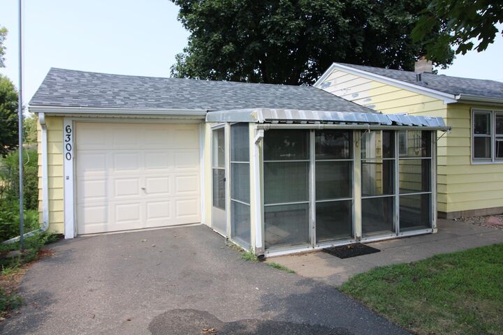 Property Photo:  6300 60th Avenue N  MN 55428 