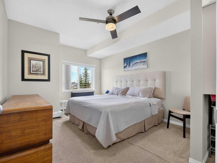 Property Photo: 72 Quigley Drive 201 AB T4C 2K6