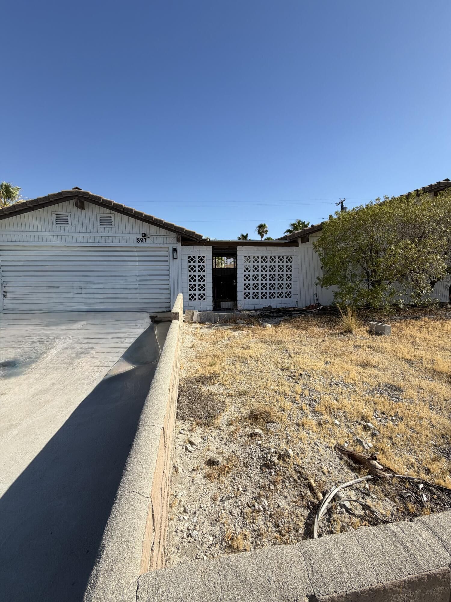 Property Photo:  897 E Racquet Club Road  CA 92262 