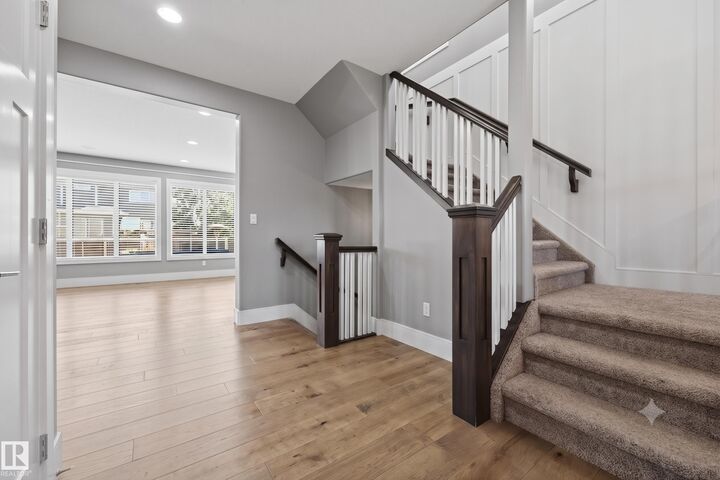 Property Photo: 1305 Hainstock Way SW AB T6W 3B6