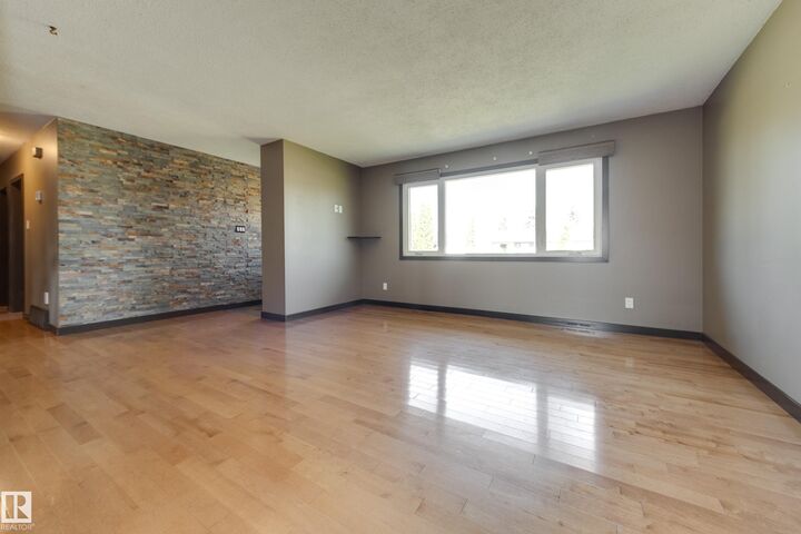 Property Photo:  8003 136 Avenue NW  AB T5C 2K8 