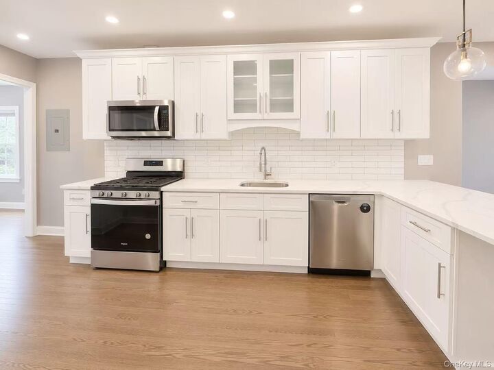 Property Photo:  68-02 Jay Ave  NY 11378 