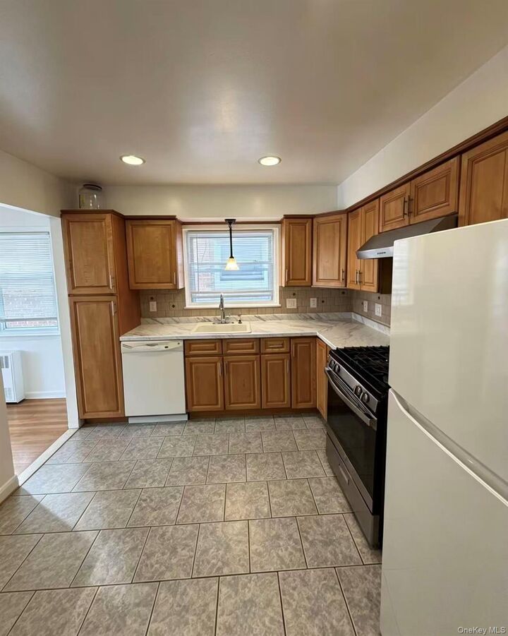 Property Photo:  4327 215th Street  NY 11361 
