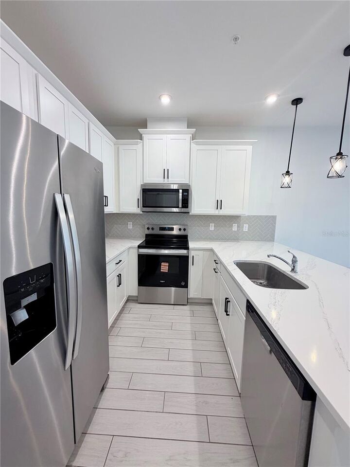 Property Photo:  9855 Walkway Dr  FL 32832 