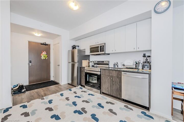 Property Photo:  101 Golden Eagle Road 411  ON N2V 1C3 