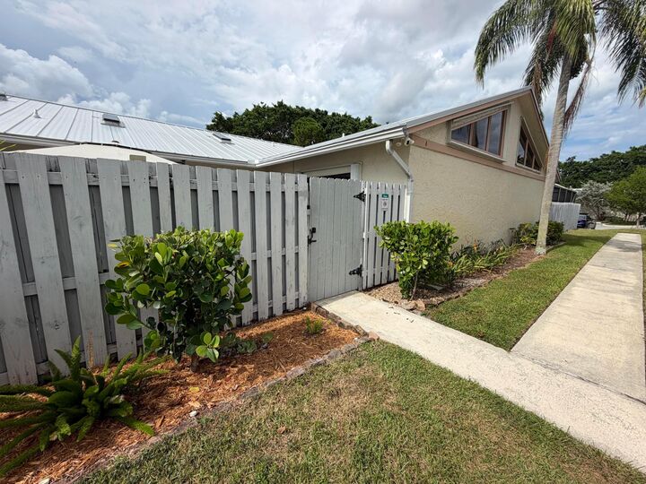 Property Photo:  8847 Thumbwood Circle A  FL 33436 