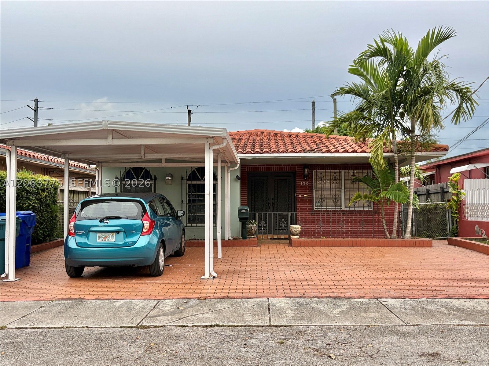 Property Photo:  320 NW 61st Ave  FL 33126 